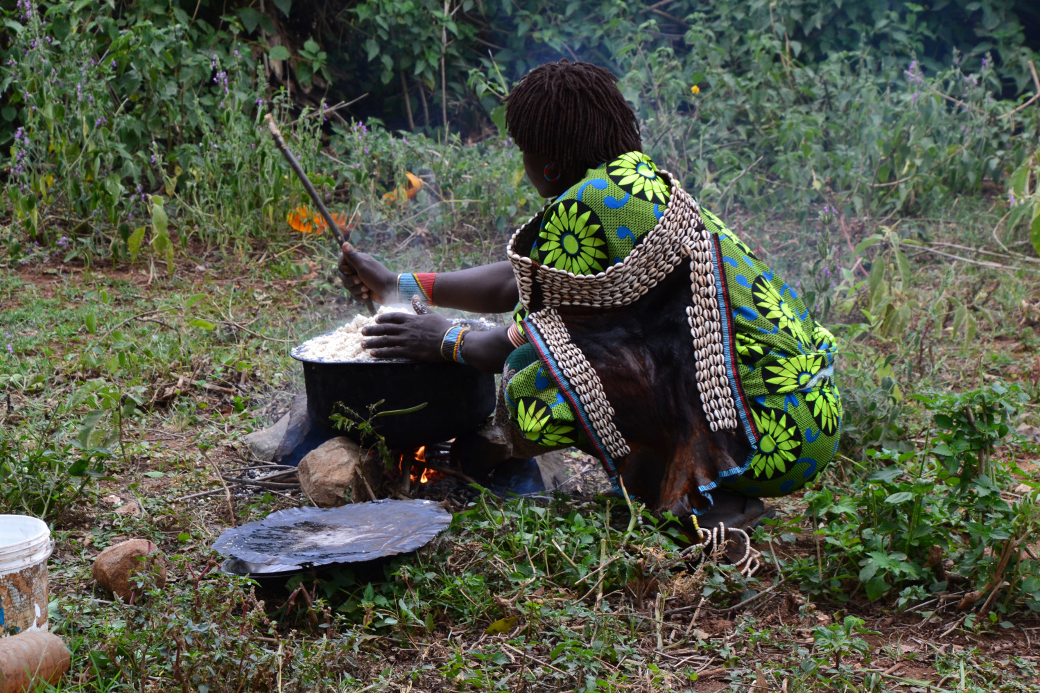 Bena women in Alte Argude Village preparing food for us